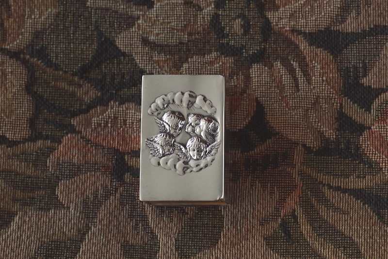 エンジェルズヘッズのシルバーマッチカバー　ジョシュア・レイノルズ　イギリス　アンティークストリュフ